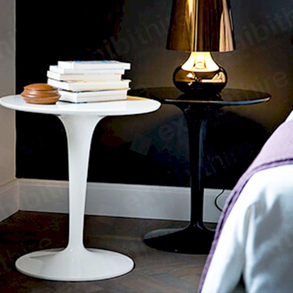 The Tip Top Table can be hired in black, white or clear and makes a stunning side table at an exhibition or event.
